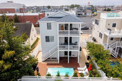 Steps to Fantasy Island! Luxury Beach Home w/ Pool & Game Room, sleeps 18!