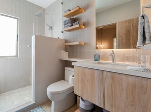 Shower, hair dryer, towels, soap