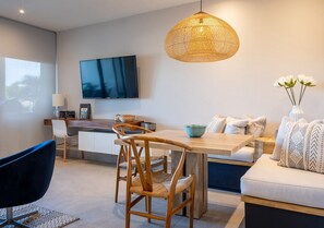 Smart TV, books - Super Clean Beach Condo with Vast Oceanfront Views near Marina Playa Flamingo  (Playa Flamingo)