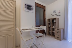 Studio Ville, balcon | Coin séjour
