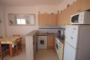 Fridge, microwave, oven, coffee/tea maker