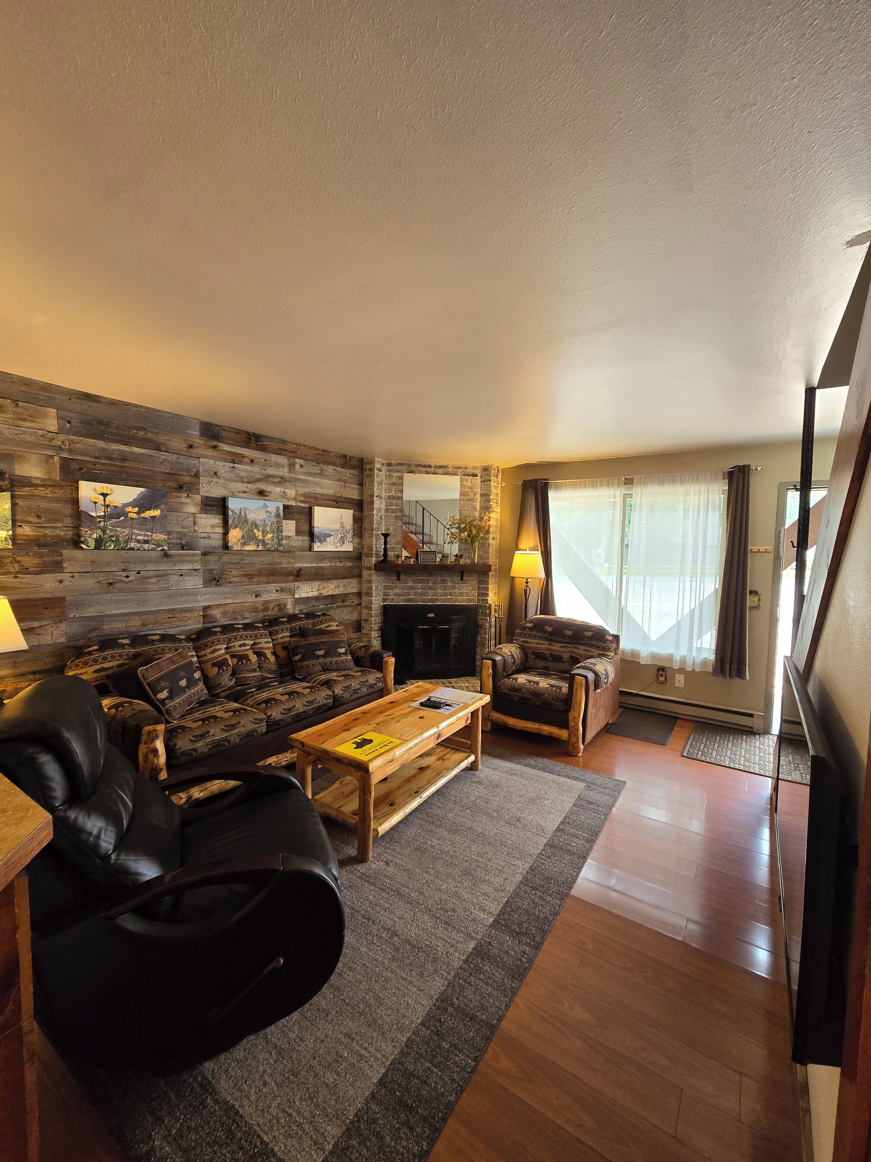 Signature Townhome | Living area | 40-inch Smart TV with cable channels