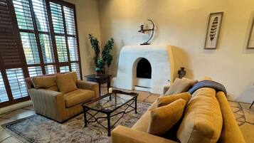 Smart TV, fireplace, books