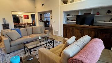 Smart TV, fireplace, books