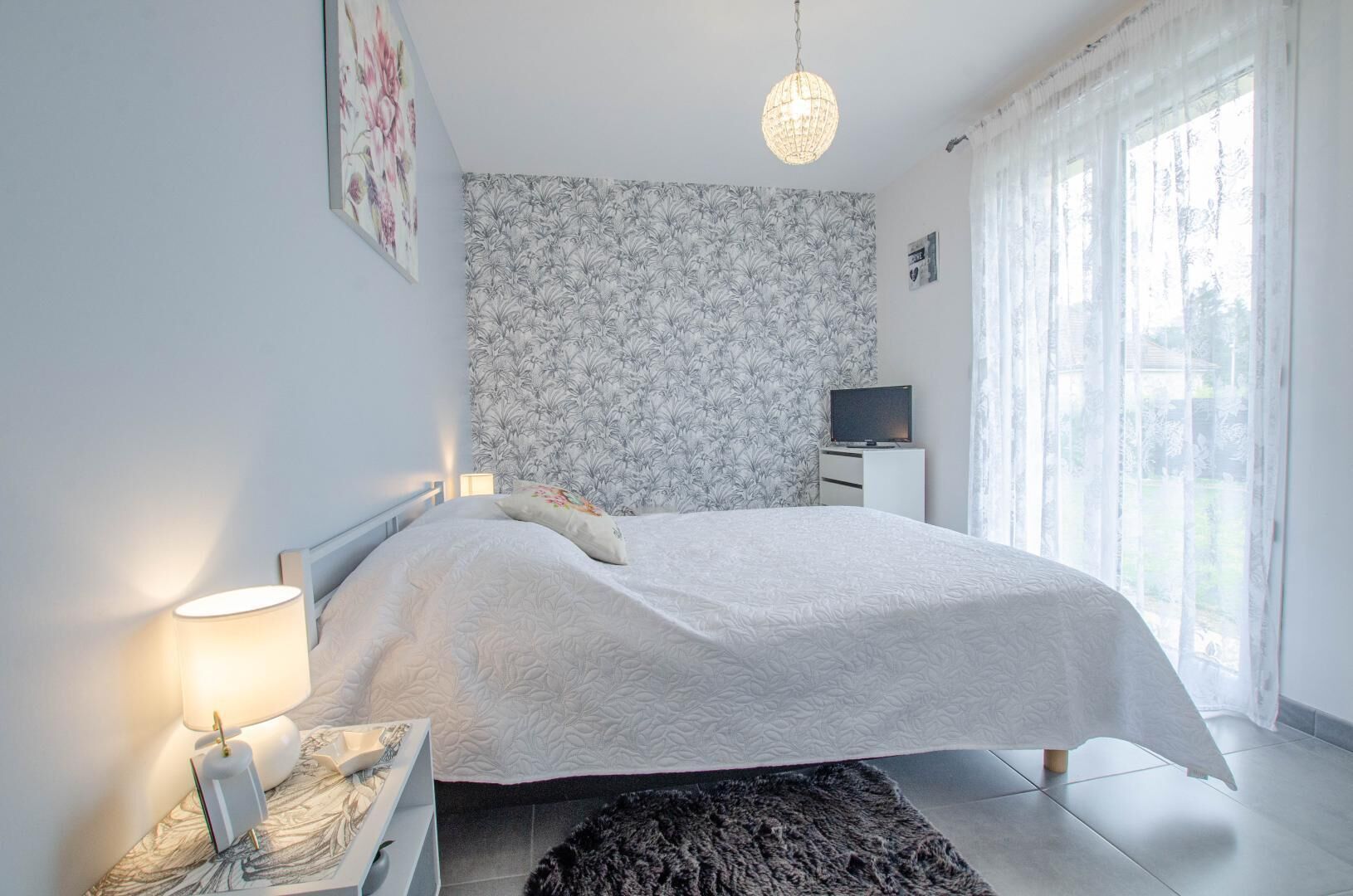 3 dormitoris i un bressol de viatge 