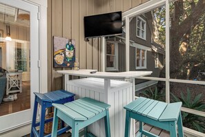 Outdoor dining - Secluded five bedroom home with great layout secluded in maritime forest! (Bald Head Island)