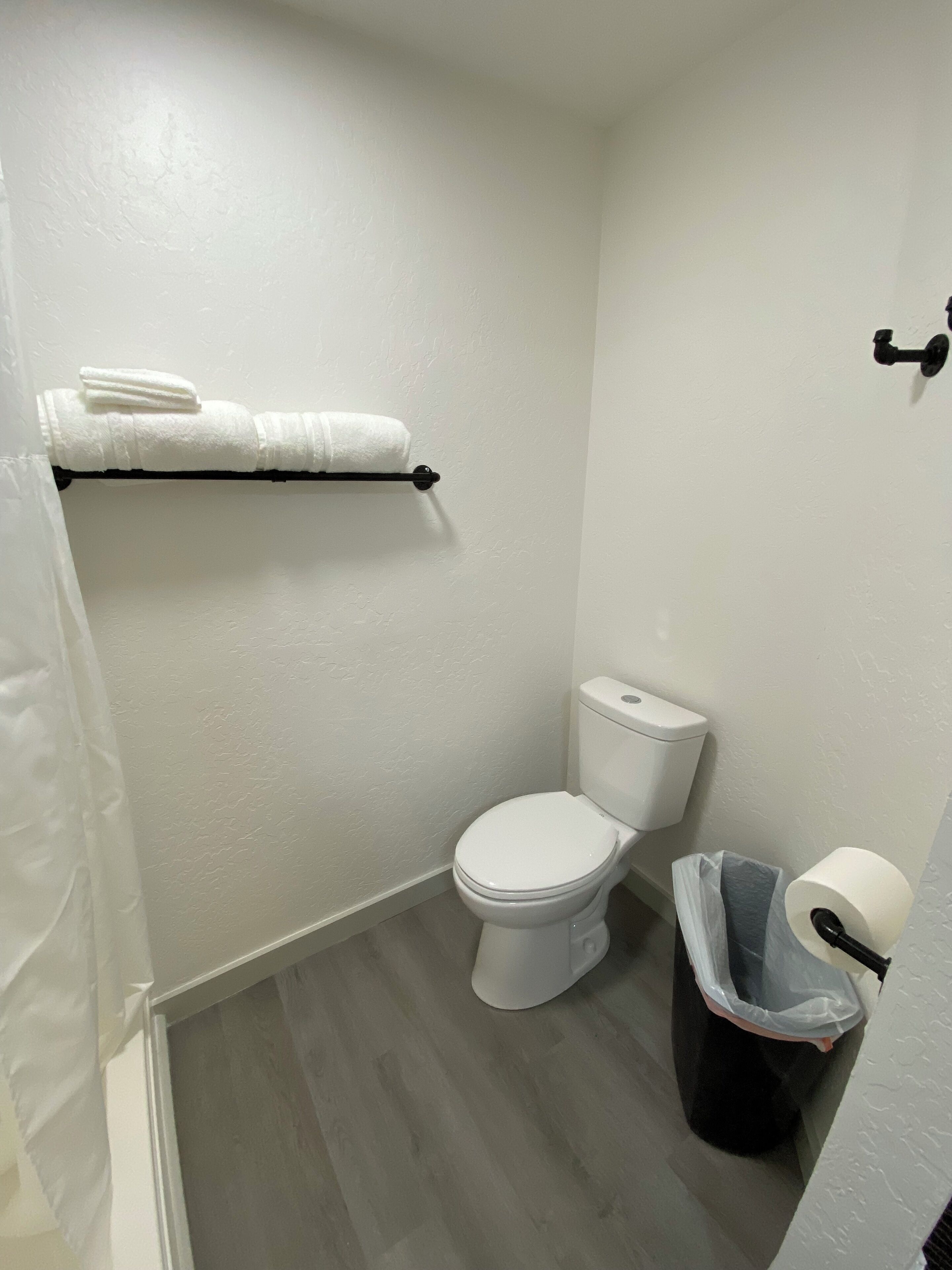 Hair dryer, towels, soap, toilet paper