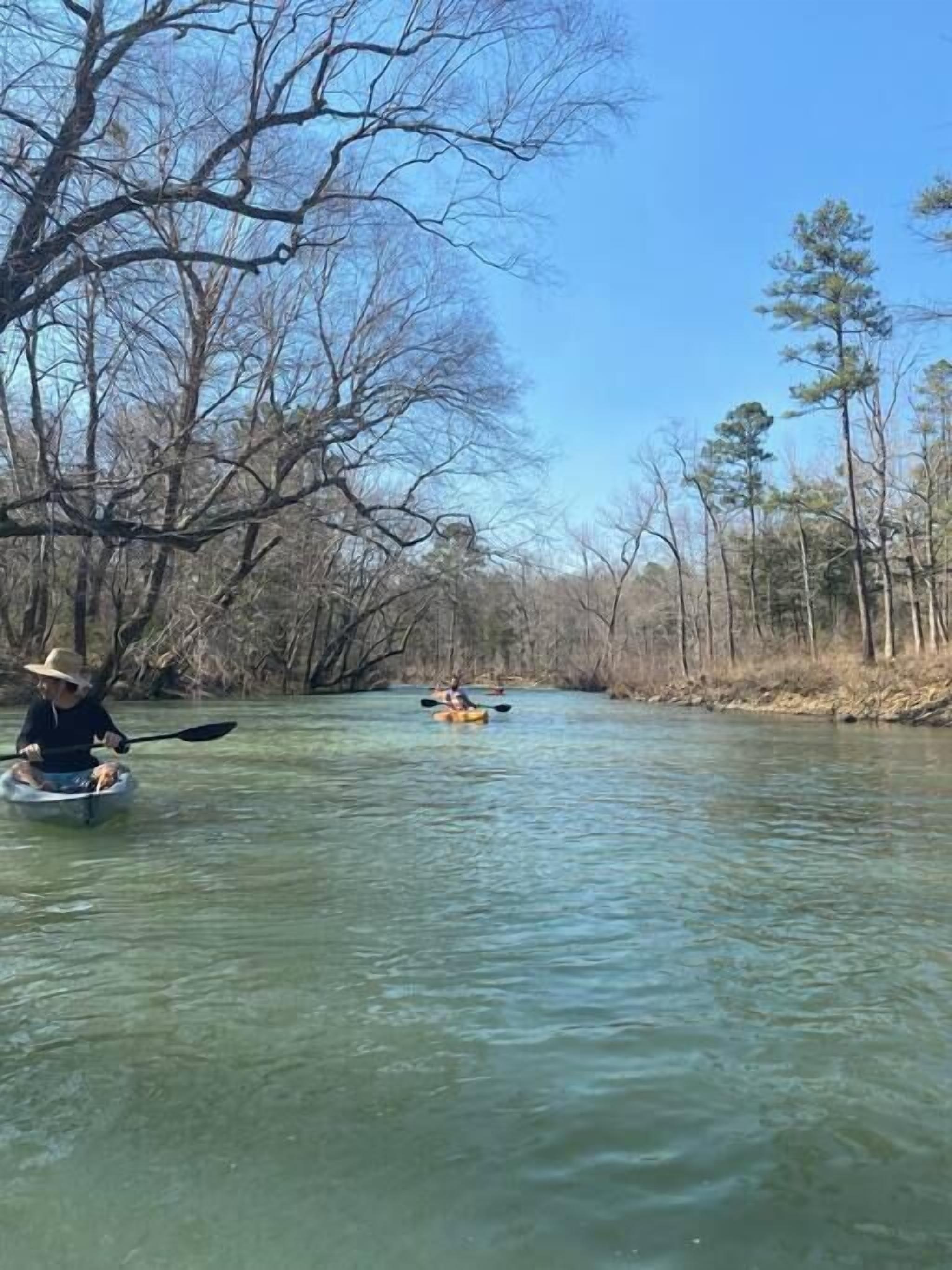 A river scene with kayaks.
