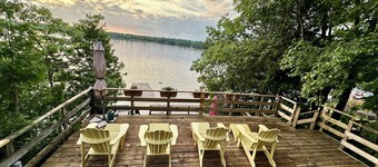 Renovated water front cottage w/firepit, multi level decks & screened in porch.