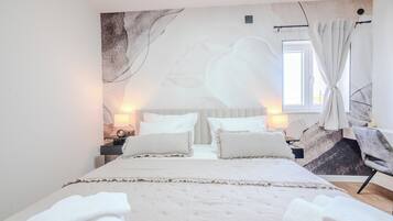 Apartment, 2 Bedrooms, Sea View | Individually decorated, laptop workspace, iron/ironing board, free WiFi