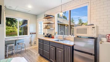 Fridge, microwave, coffee/tea maker, toaster