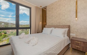 4 chambres, coffres-forts dans les chambres, lit parapluie