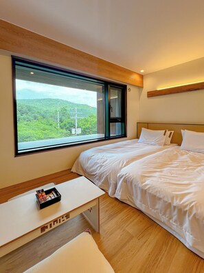 Deluxe Twin kamer, uitzicht op bergen | Uitzicht op de bergen