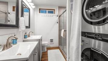 Shower, hair dryer, towels, soap