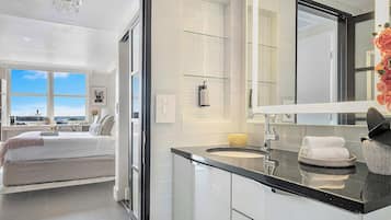 Iron/ironing board, travel crib, WiFi, bed sheets