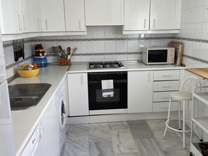 Fridge, microwave, oven, dishwasher - Spacious Home Guadalvillas 128 with Terrace, 2 Pools & 2-Min Walk to Beach in Marbella (Marbella)