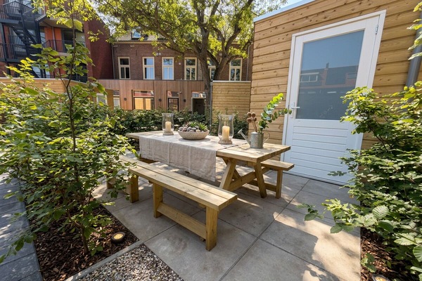 Private garden terrace with outdoor dining area, comfortable seating, and a peaceful setting to relax and enjoy the fresh air.