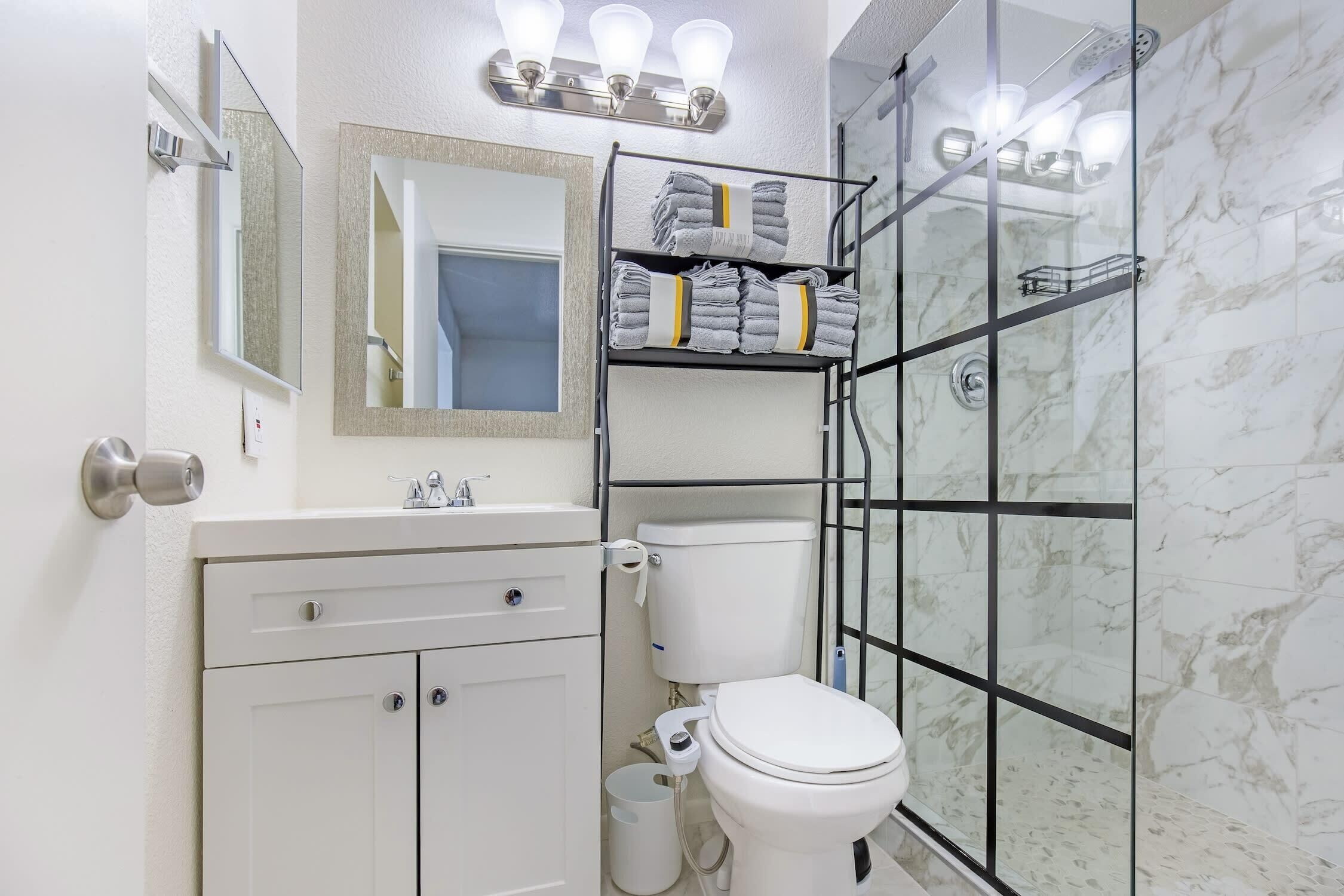 Shower, hair dryer, towels, soap