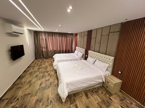 Family Twin Room, Jetted Tub, Mountain View | Free WiFi - Pyramids Enigma Grand Lodge (Giza)