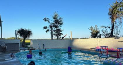 High Tides & Positive Vibes with an elevator, pool and dock!