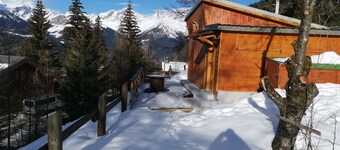 Chalet with terrace and breathtaking view. The grounds are adjacent to the chalet for BBQs etc.