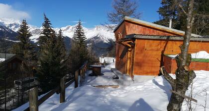Chalet with terrace and breathtaking view. The grounds are adjacent to the chalet for BBQs etc.