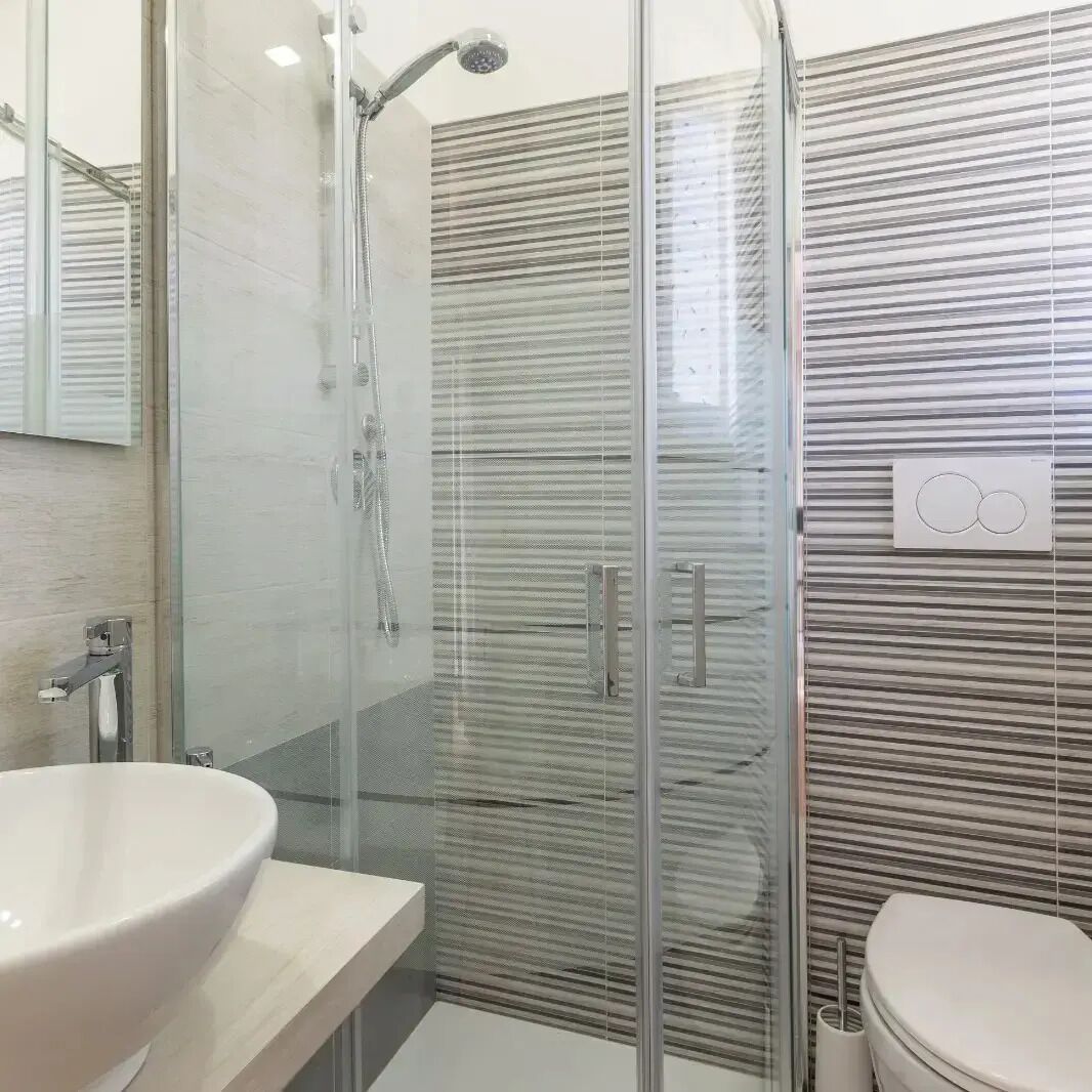 Shower, eco-friendly toiletries, hair dryer, towels