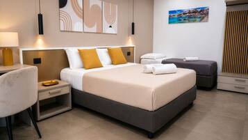Standard Triple Room, Non Smoking, Private Bathroom | Memory-foam beds, minibar, desk, laptop workspace