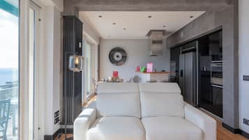 Apartment, Balcony, Sea View | Living area | 35-inch TV with digital channels