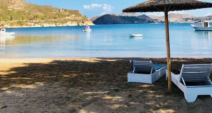 Patmos Beach Stone House, in Sapsila. Slow living on the beach.