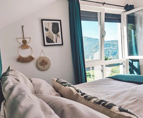 Luxurious villa surrounded by greenery with breathtaking views of the city