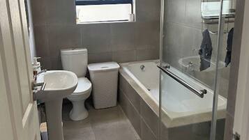 Hair dryer, towels, soap, shampoo