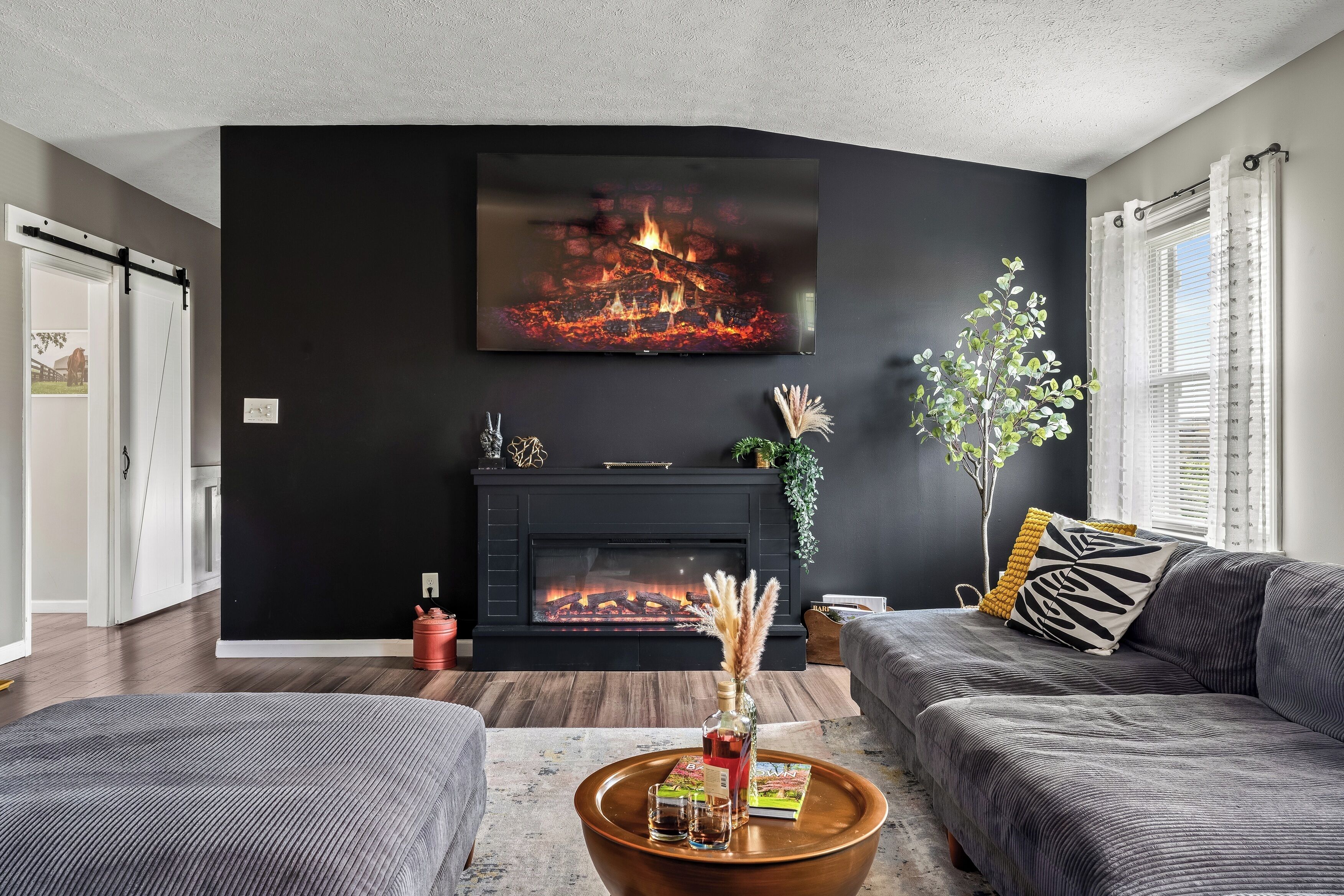 Smart TV, fireplace, foosball, books