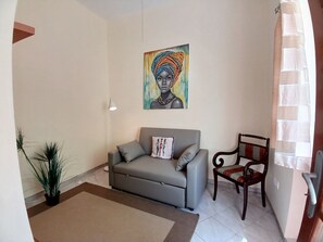 Økonomi-dobbeltrom, 1 queensize-seng, kjøkken, ved stranden | Oppholdsområde