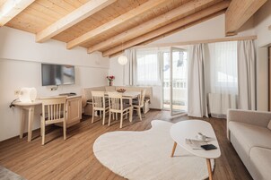 Apartment, 2 Bedrooms, Balcony | Living area | 32-inch flat-screen TV with cable channels