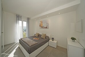 Departamento, balcón | 2 habitaciones, tabla de planchar con plancha y wifi gratis 