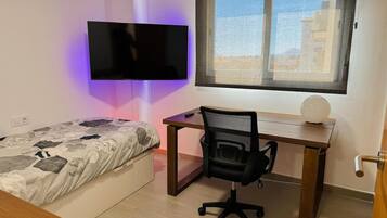 2 dormitorios, tabla de planchar con plancha, wifi gratis y ropa de cama