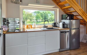 Fridge, microwave, dishwasher, coffee/tea maker
