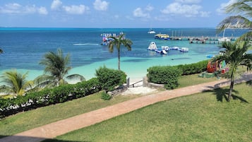 On the beach, sun loungers, beach towels
