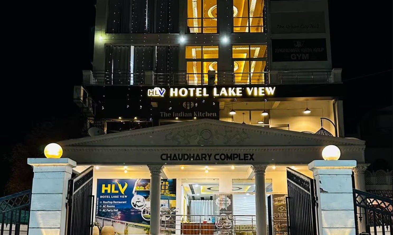 Hotel Lake View with a sign for The Indian Kitchen and Chaudhary Complex.