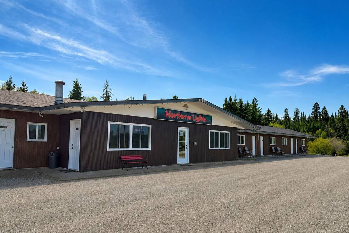 A building with a sign reading 'Northern Lights' and a covered outdoor seating area.