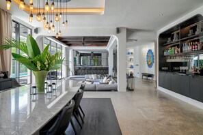 Luxury Villa | Living area | 50-inch TV with satellite channels - CARPEDIEM VILLA BALI operated by Villa Nila (Canggu)