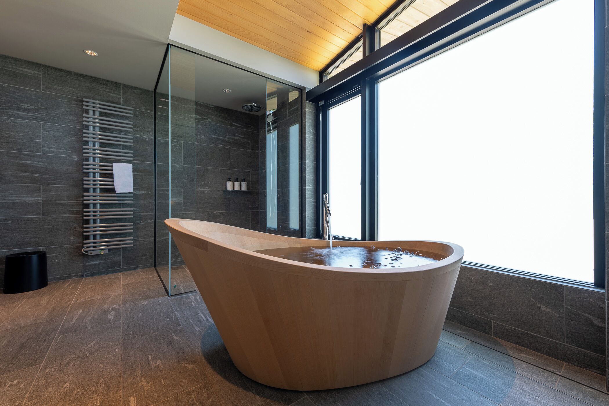 Separate tub and shower, rainfall showerhead, free toiletries