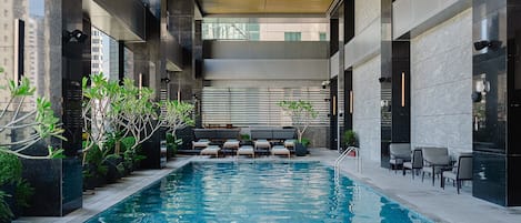 Indoor pool, open 6:30 AM to 10:00 PM, pool loungers
