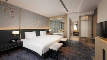 Hypo-allergenic bedding, down duvets, minibar, in-room safe