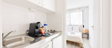 Microwave, stovetop, coffee/tea maker, toaster