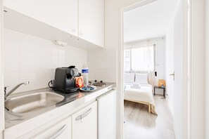 Microwave, stovetop, coffee/tea maker, toaster