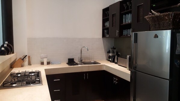 Deluxe Villa, 2 Bedrooms, Private Pool, Garden View | Private kitchen | Electric kettle, toaster - Villa Kipas Seminyak by Soo Bali (Seminyak)