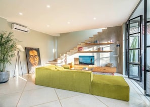 Luxury Villa | Living area | 60-inch Smart TV with digital channels, Netflix, streaming services