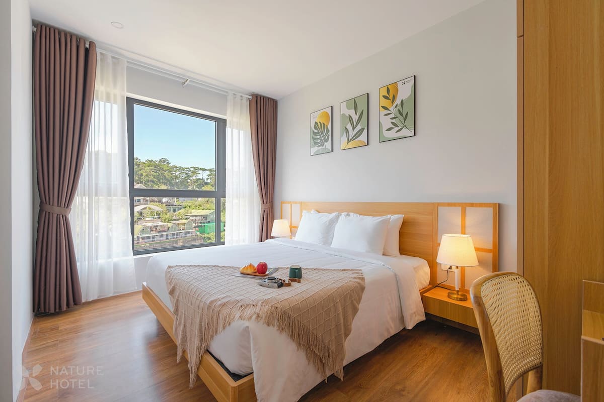 Family Suite, 2 Bedrooms | Minibar, in-room safe, desk, laptop workspace